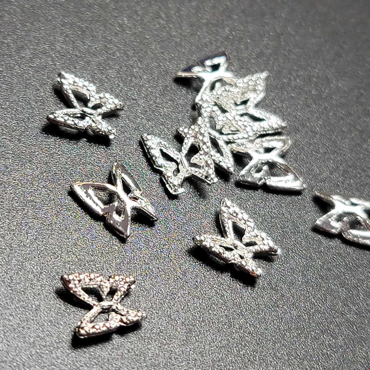 PETIT PAPILLON 0.6 CM ARGENT REFLET